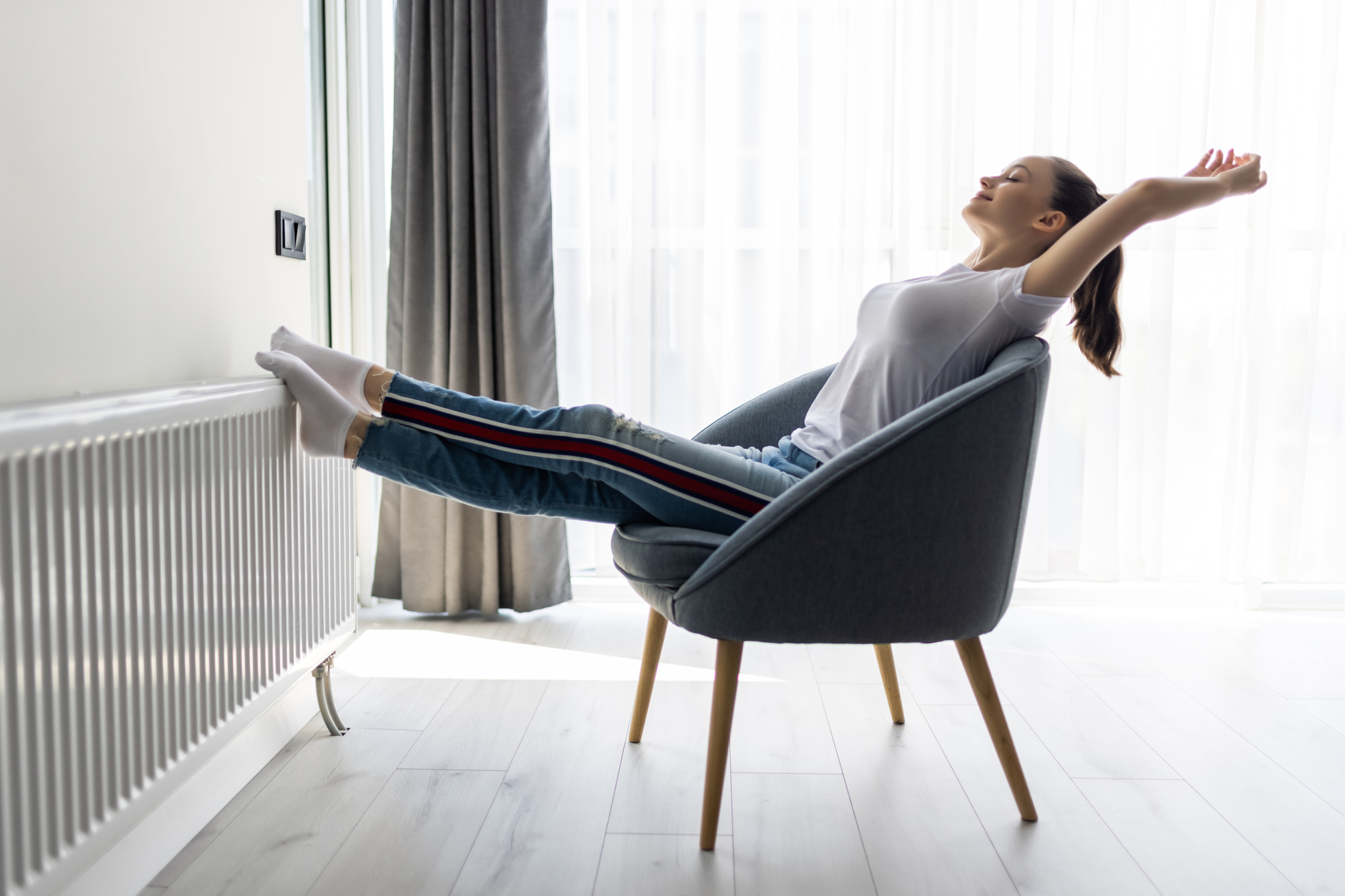 Women in chair enjoy the air conditioning
